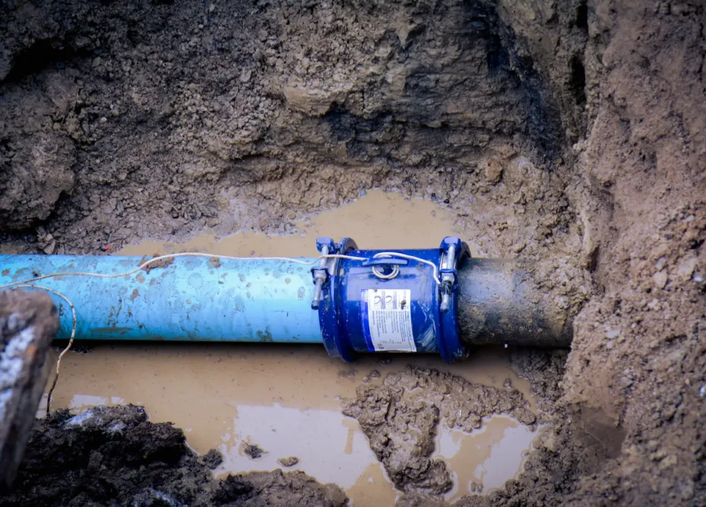 Everest Drain and Plumbing crew performing a 6 inch commercial water main replacement in Ajax after a ductile iron pipe burst