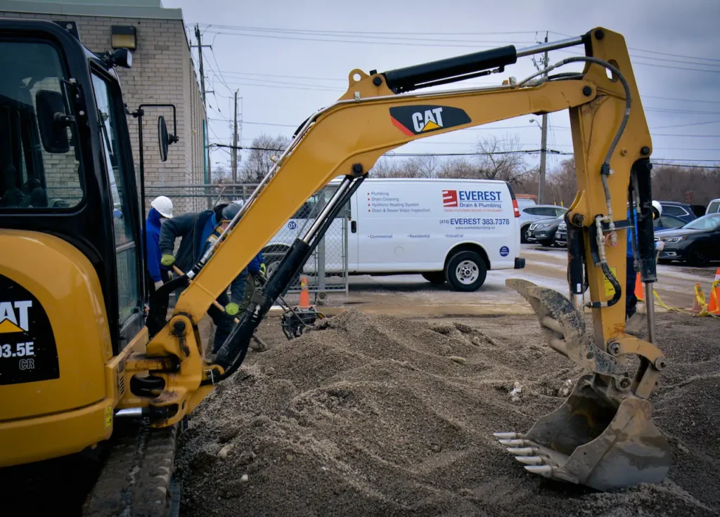 Everest Drain and Plumbing emergency water main repair crew arriving on site in Toronto